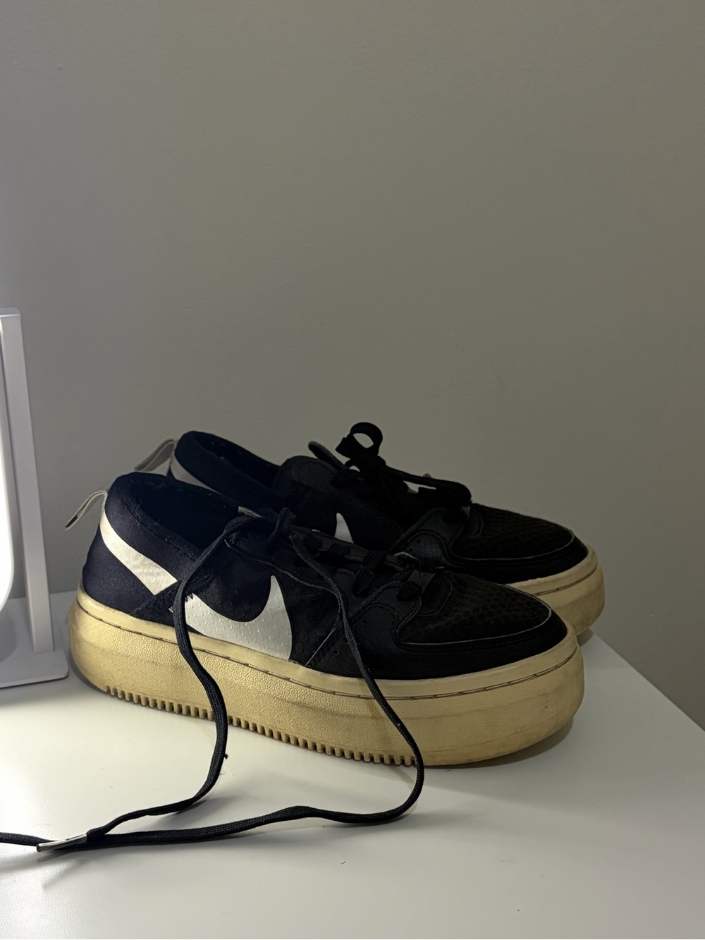 NIKE black platform sneakers